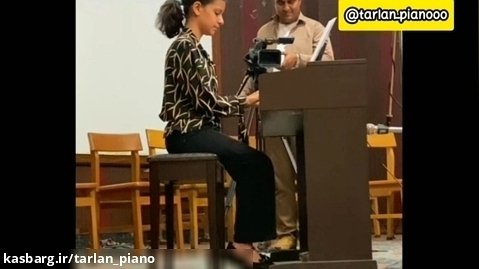 اجرای پیانو ترلان گلکارنیا در سالن کانون سراج(کپشن)
